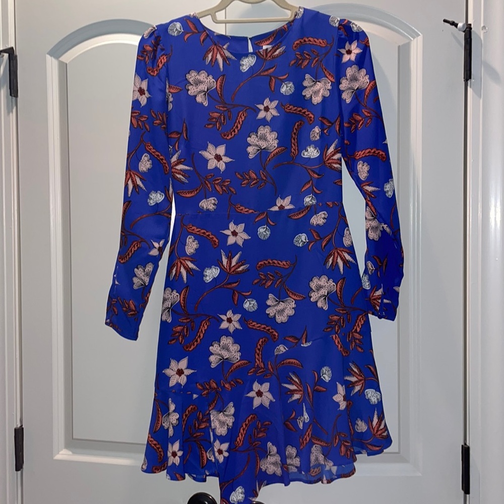 Long sleeve mini dress: asymmetrical slit in hem.